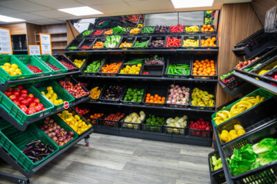 A photo of the interior of the Shoptek showroom in Leicestershire, featuring display shelving and counters